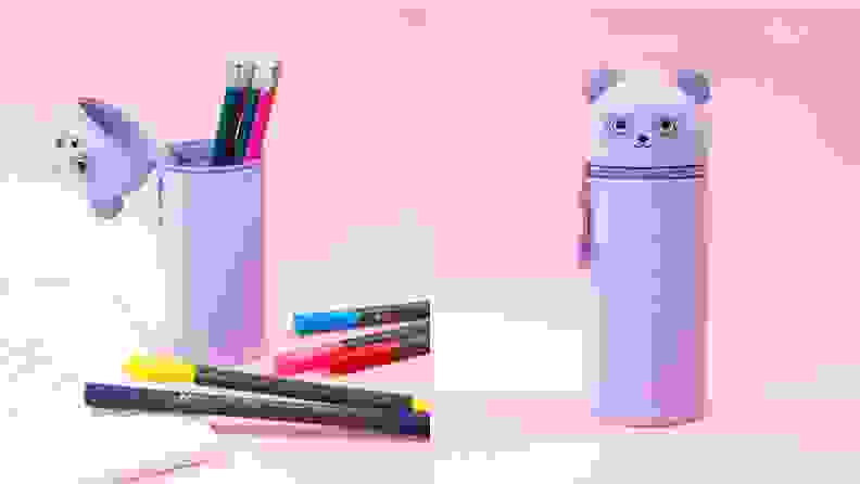 On left, purple panda pencil case holding pencils next to markers and notebook. On right, product shot of purple panda pencil case.