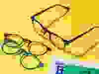 Eyeglasses on yellow background