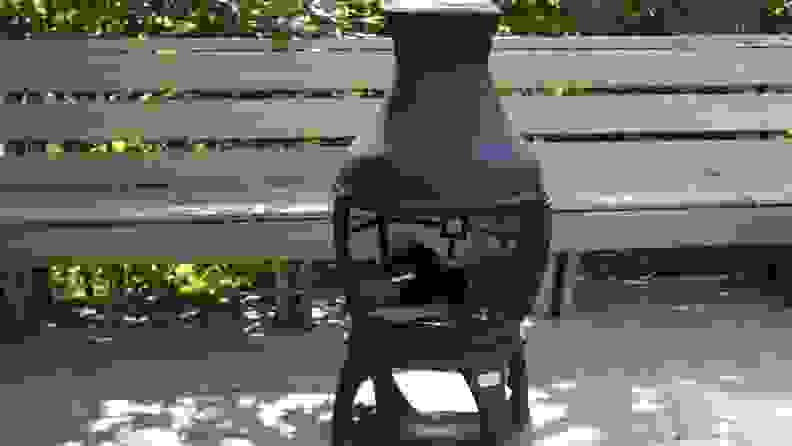 Bali Outdoors Chiminea sitting on a wood deck