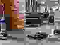 Vacuum next to carpet cleaner