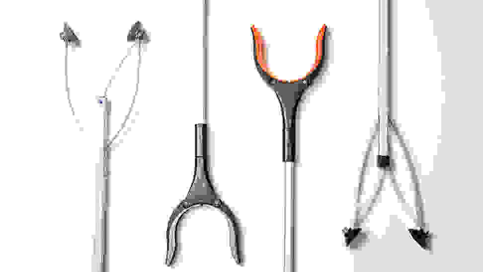 Four different reacher grabber tools on a white background