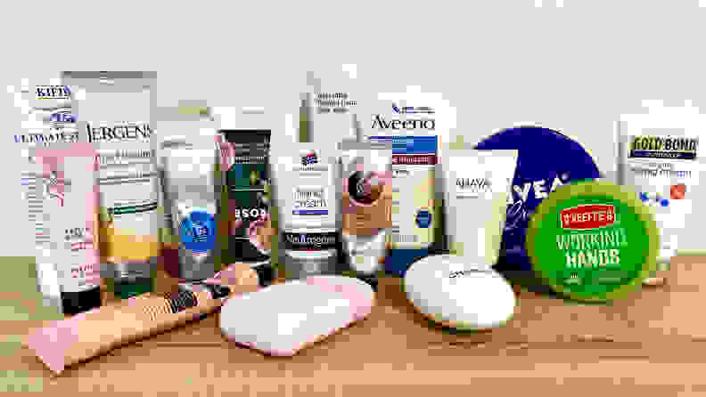 All of the hand creams sitting on a table.