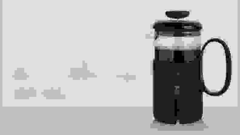 OXO French press on beige background