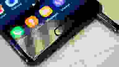 Close-up of a Samsung smartphone with a colorful touchscreen.