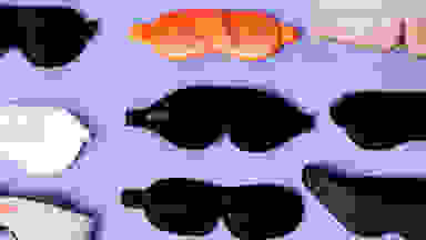 A collection of sleep masks against a purple background