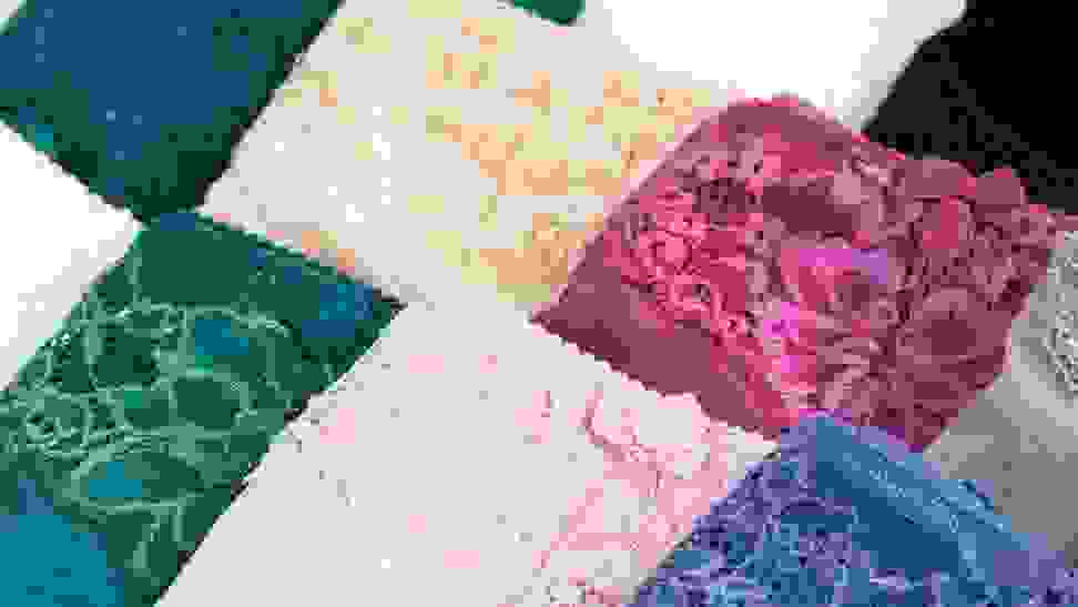 A bunch of lace women's underwear in different colors.
