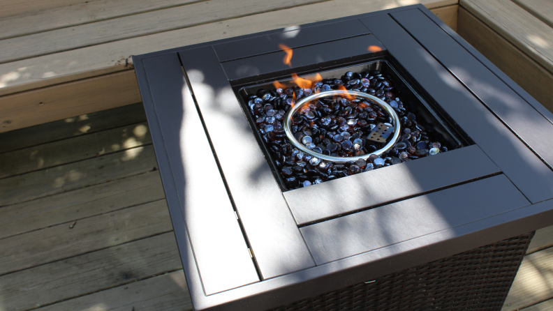 The Best Choice Fire Pit table shown ignited