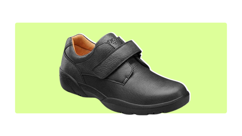 Dr. Comfort William X shoes on a light green background