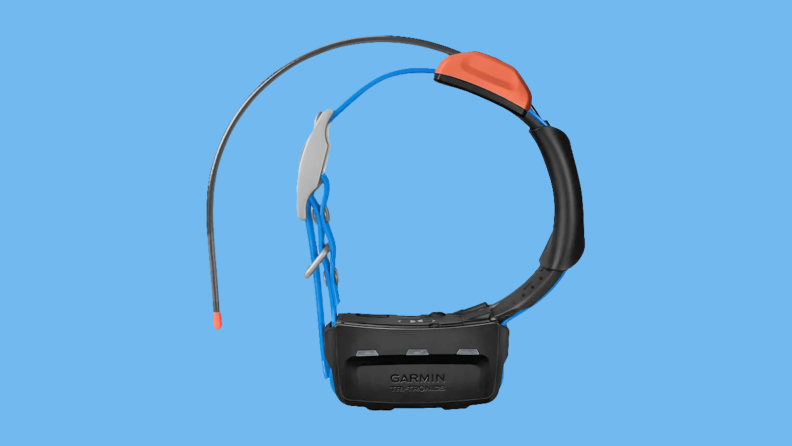 Garmin dog tracker collar on colored background