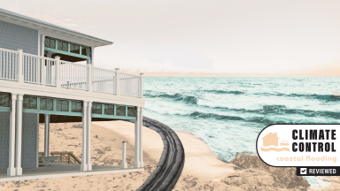 Residential home on coastal shore in front of ocean.