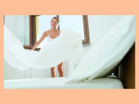 A woman changing her sheets