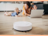 Robot vacuum cleaning the floor in front of a mother and child