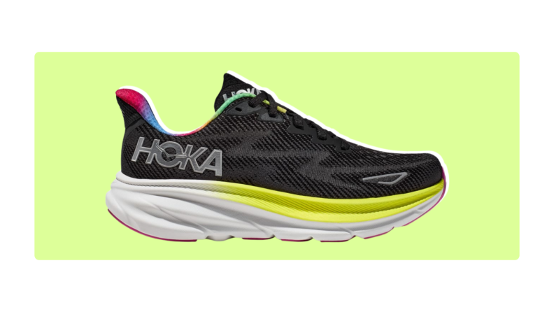 Black Hoka Clifton 9 sneakers on a light green background