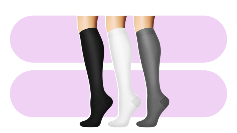 Three tall Sooverki socks, black, white, and gray, against a purple background.