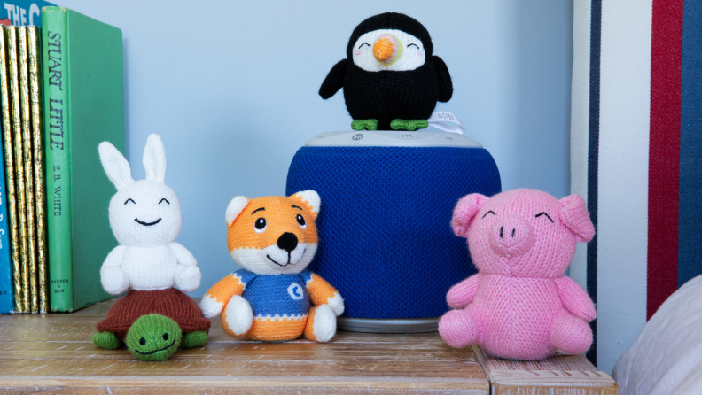 A Storypod kids' audio player with a handful of Craftie figurines.