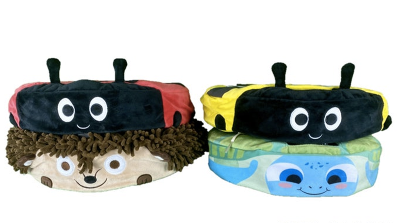 Four robot vacuums with covers that make them look like ladybugs, hedgehogs, and turtles