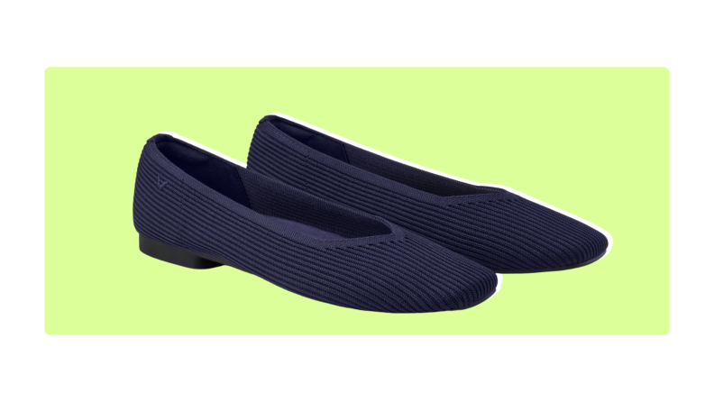 Purple Margot heels on a light green background